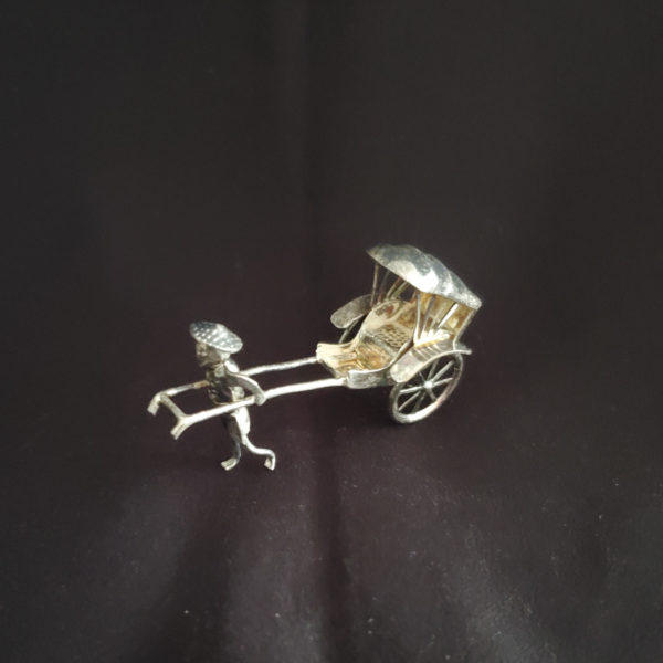 Vintage silver rickshaw in box with glass lid
