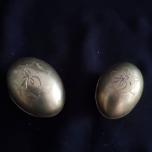 Pair of antique brass egg trinket boxes from China